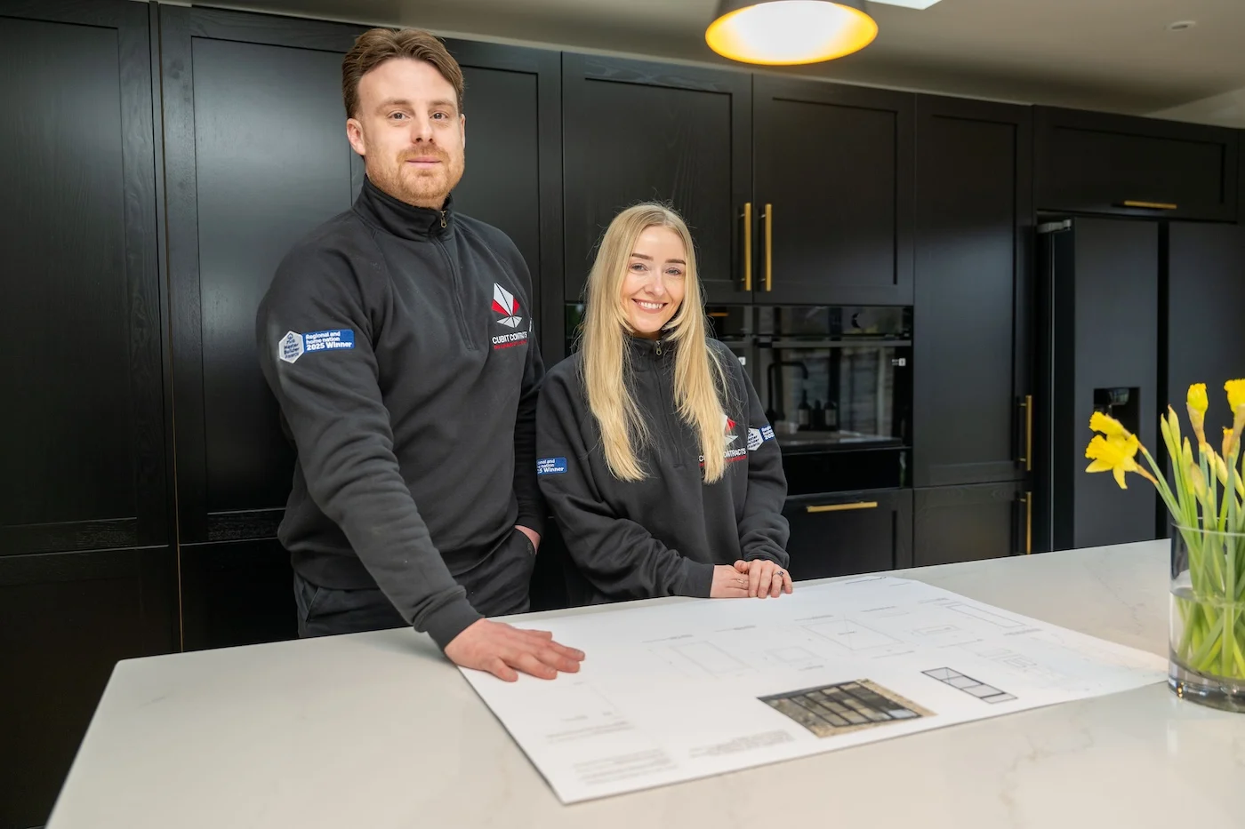 cubit team looking at some building plans