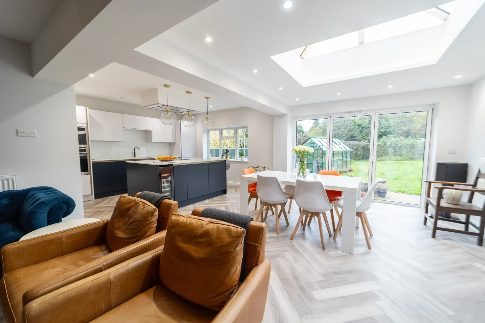 rear house extension with large glazing and modern open plan kitchen design